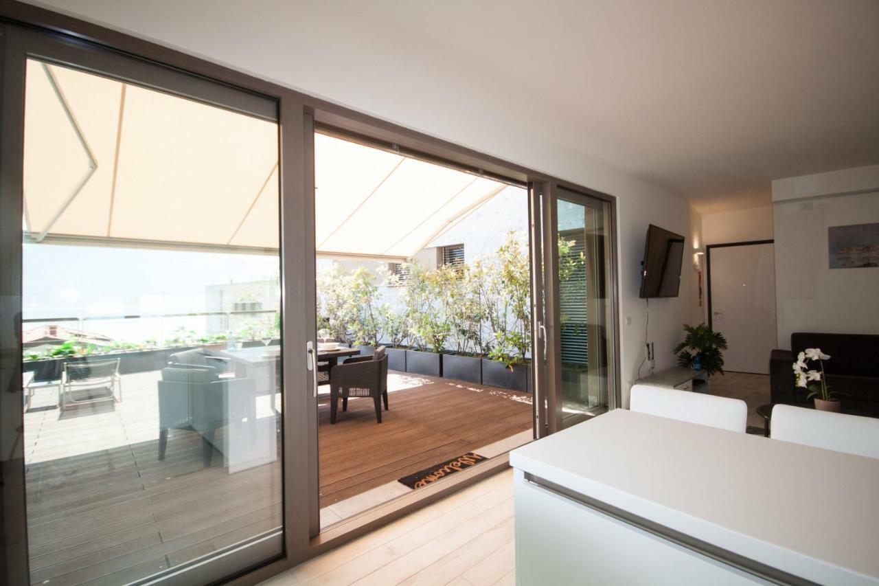 Terrazza Sul Lago - Acquaseria, San Siro By Lovecomo מראה חיצוני תמונה